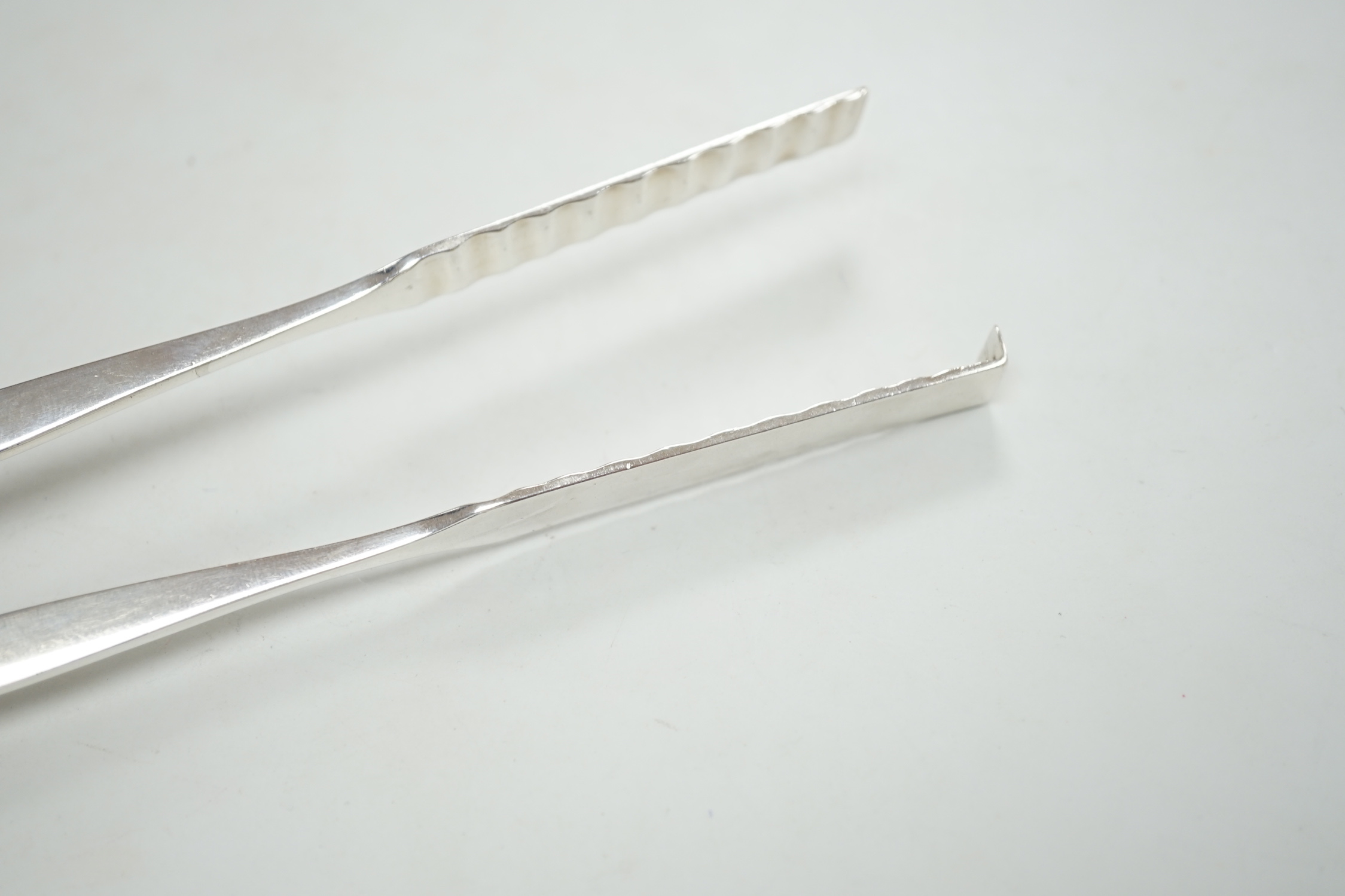A pair of George III silver asparagus tongs, William Burch?, London, circa 1790, 22.8cm, 3.9oz.